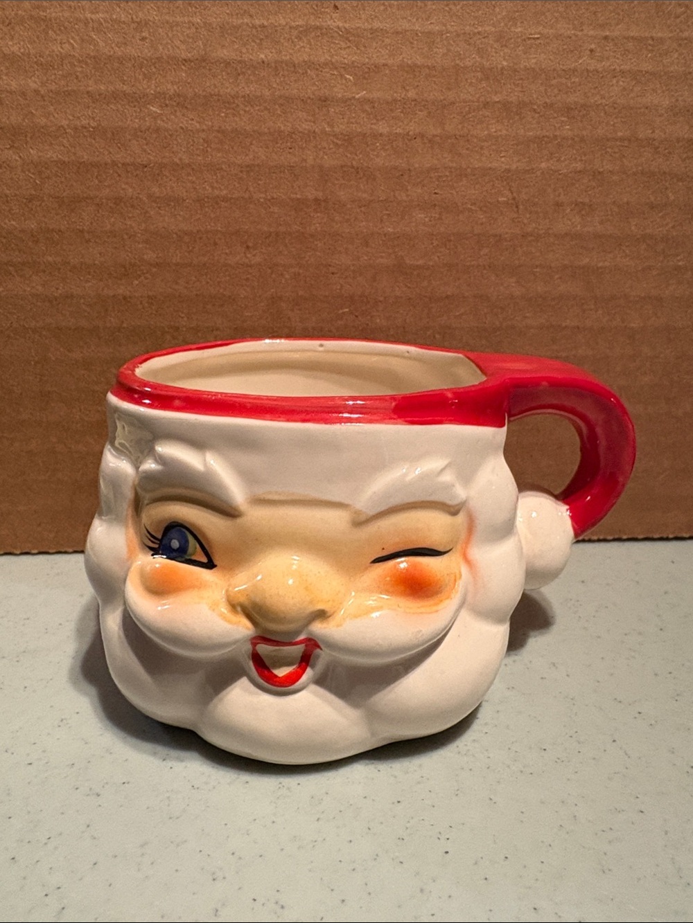 Vintage 1960 Holt Howard winking Santa Claus.